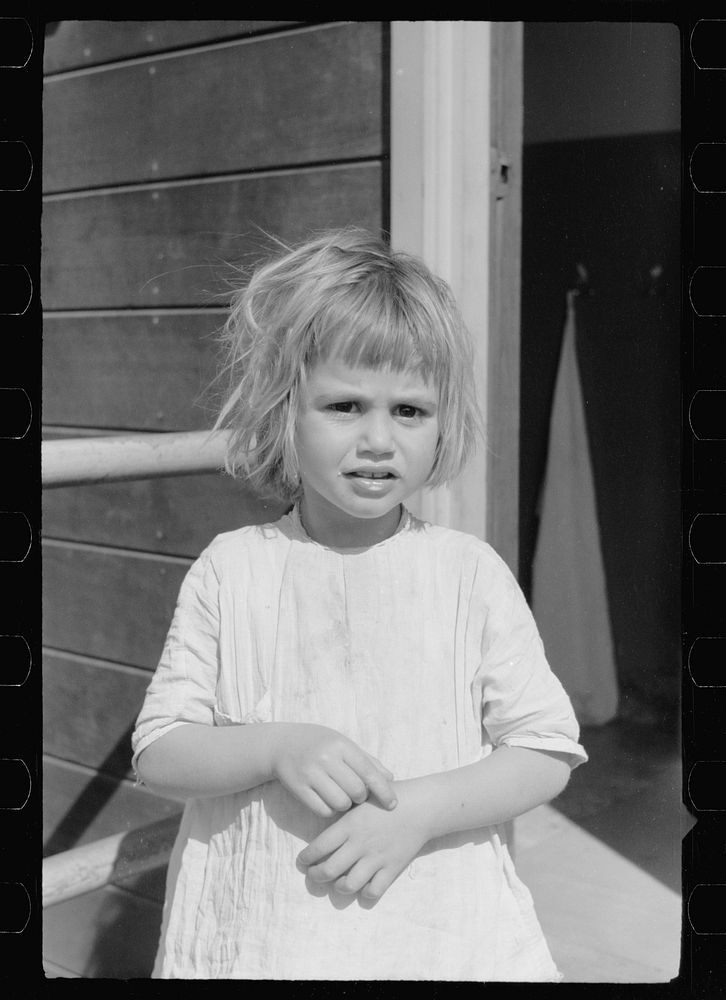 Migratory worker's child, nursery school, FSA (Farm Security Administration) camp, Weslaco, Texas. Sourced from the Library…