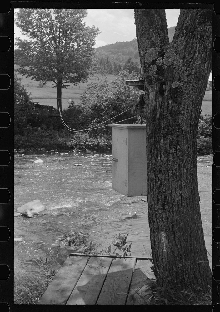 [Untitled photo, possibly related to: Near Woodstock, Vermont, mail box on pulley for people who live across the creek].…