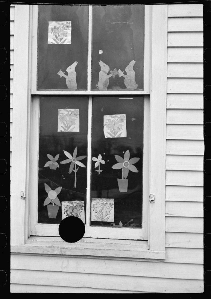 [Untitled photo, possibly related to: Children's art work in window of school, Jackson, Ohio]. Sourced from the Library of…