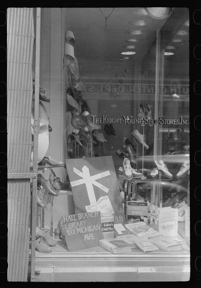 [Untitled photo, possibly related to: Books on display in show store window, 47th Street, Chicago, Illinois]. Sourced from…