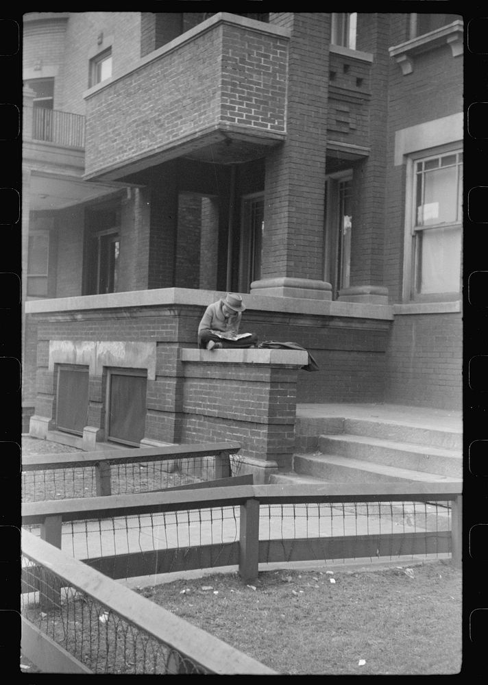 [Untitled photo, possibly related to: Child in front of apartment building in the better section of the Black Belt, Chicago…