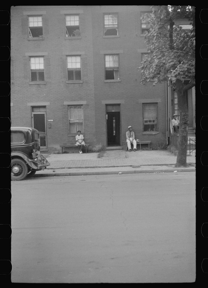 [Untitled photo, possibly related to: es and their home in the alley dwelling area. Note: building next door is gutted.…