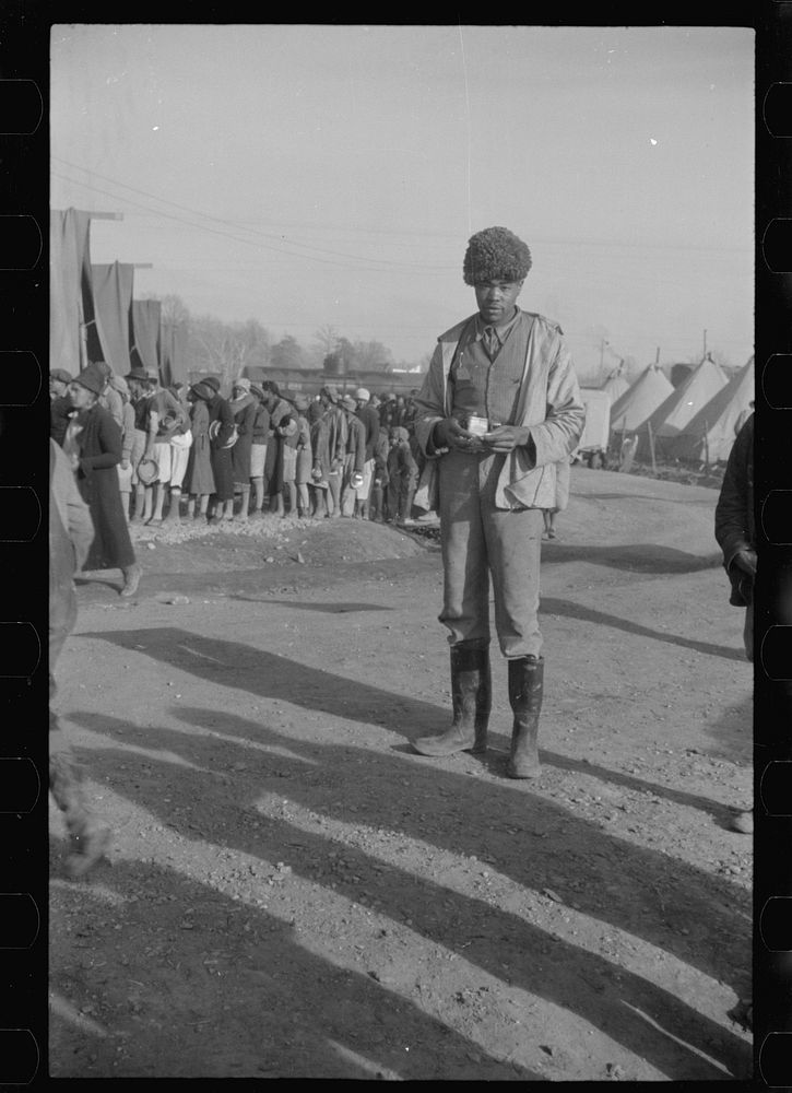 [Untitled photo, possibly related to:  with a fur cap, a flood refugee in the camp at Forrest City, Arkansas]. Sourced from…