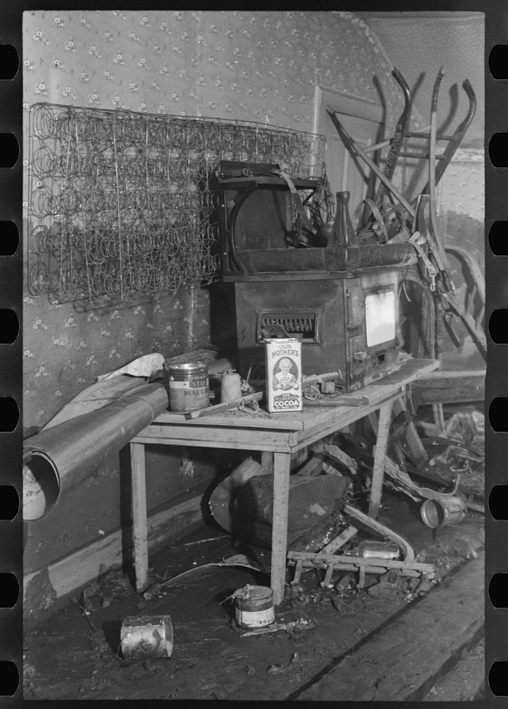Interior of a farmhouse near Ridgeley, Tennessee, after the 1937 flood waters had subsided. Sourced from the Library of…