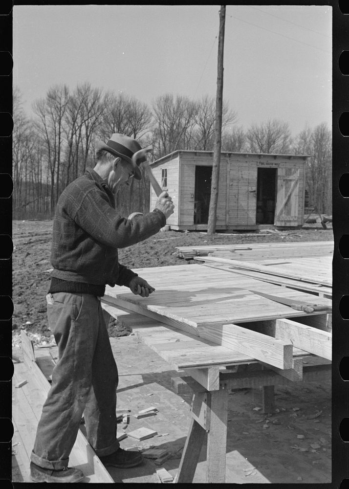 Carpenter at the Greenbelt Project, Berwyn, Maryland. Sourced from the Library of Congress.