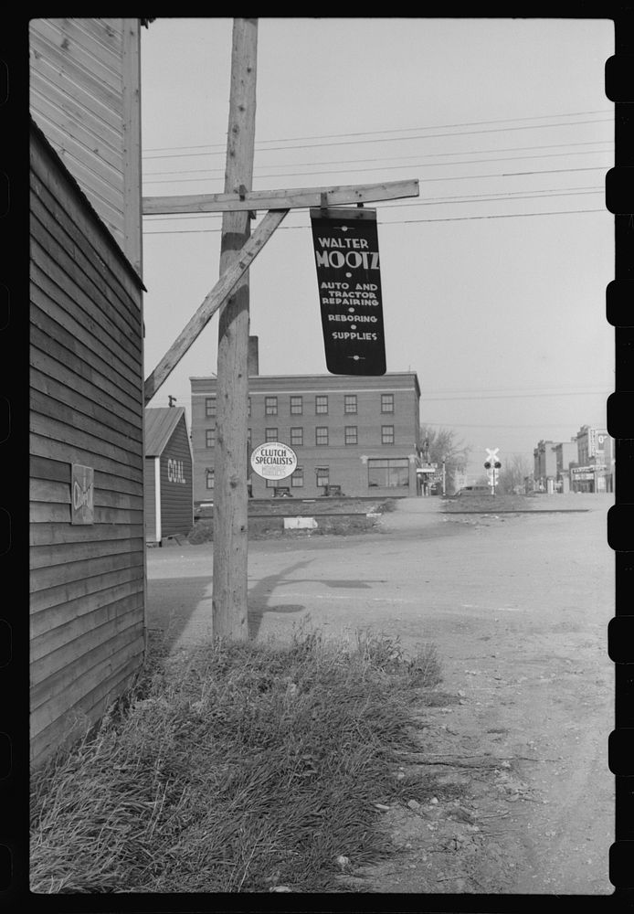 [Untitled photo, possibly related to: Metal sign blowing in the wind. Doyon, North Dakota]. Sourced from the Library of…