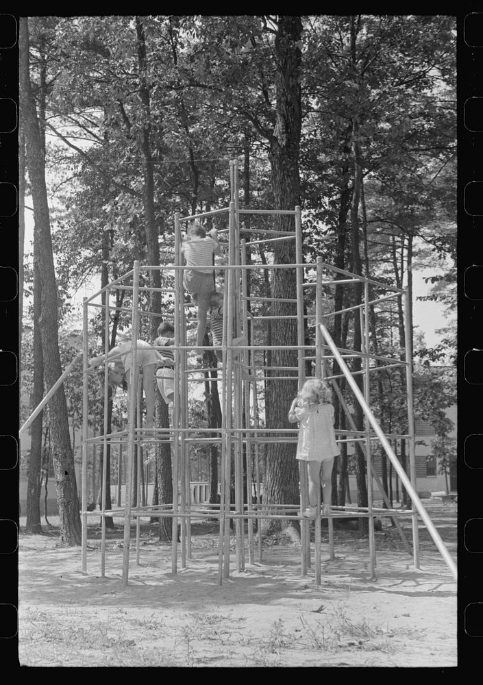[Untitled photo, possibly related to: Children playing at Greenbelt, Maryland]. Sourced from the Library of Congress.