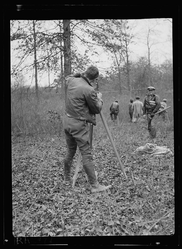 Surveyor at work. Berwyn project, Berwyn, Maryland. Sourced from the Library of Congress.