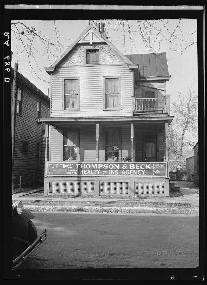 House in Cincinnati showing its conversion into businnesses and blight. Sourced from the Library of Congress.