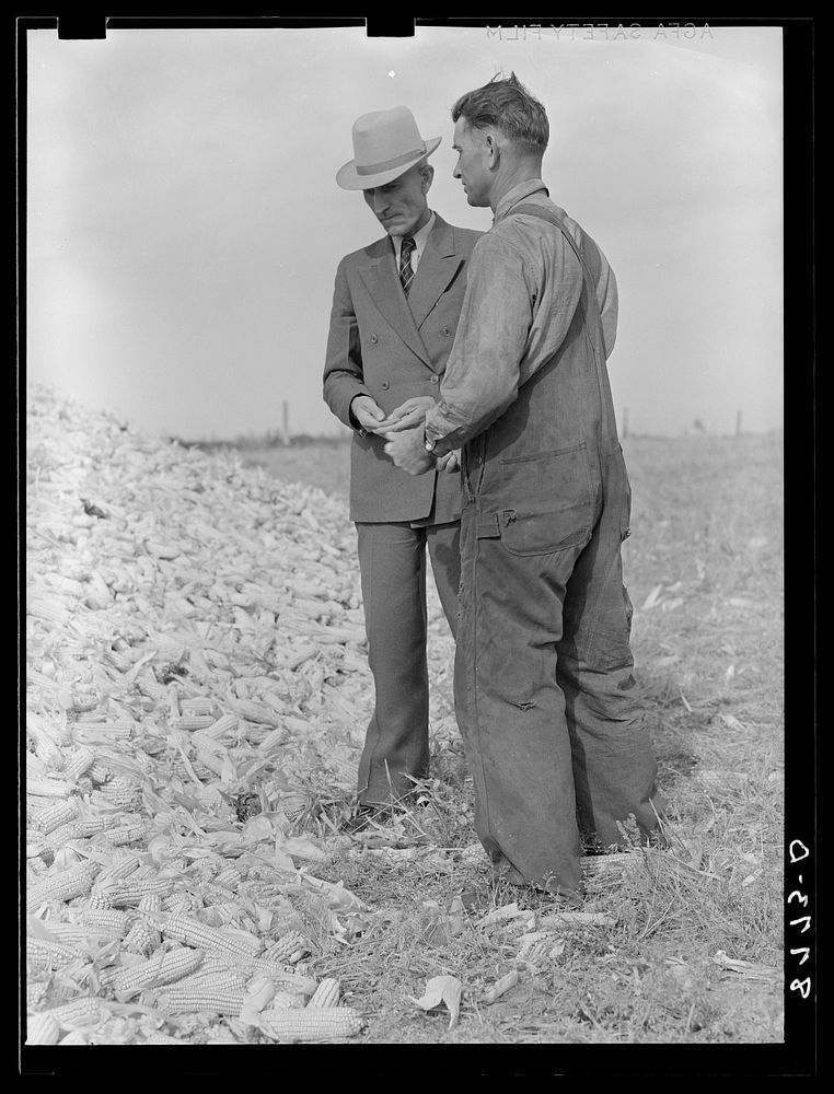 County supervisor talking with rehabilitation client. Lincoln County, Nebraska. Sourced from the Library of Congress.