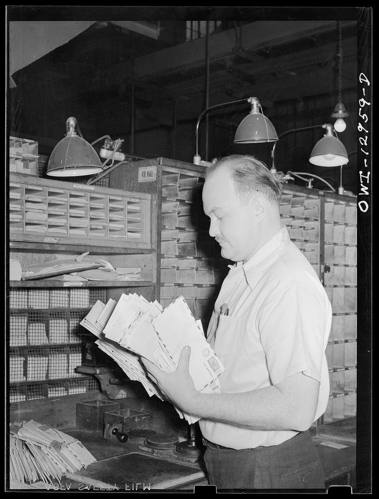 Washington, D.C. Sorting air mail at the main post office. Sourced from the Library of Congress.