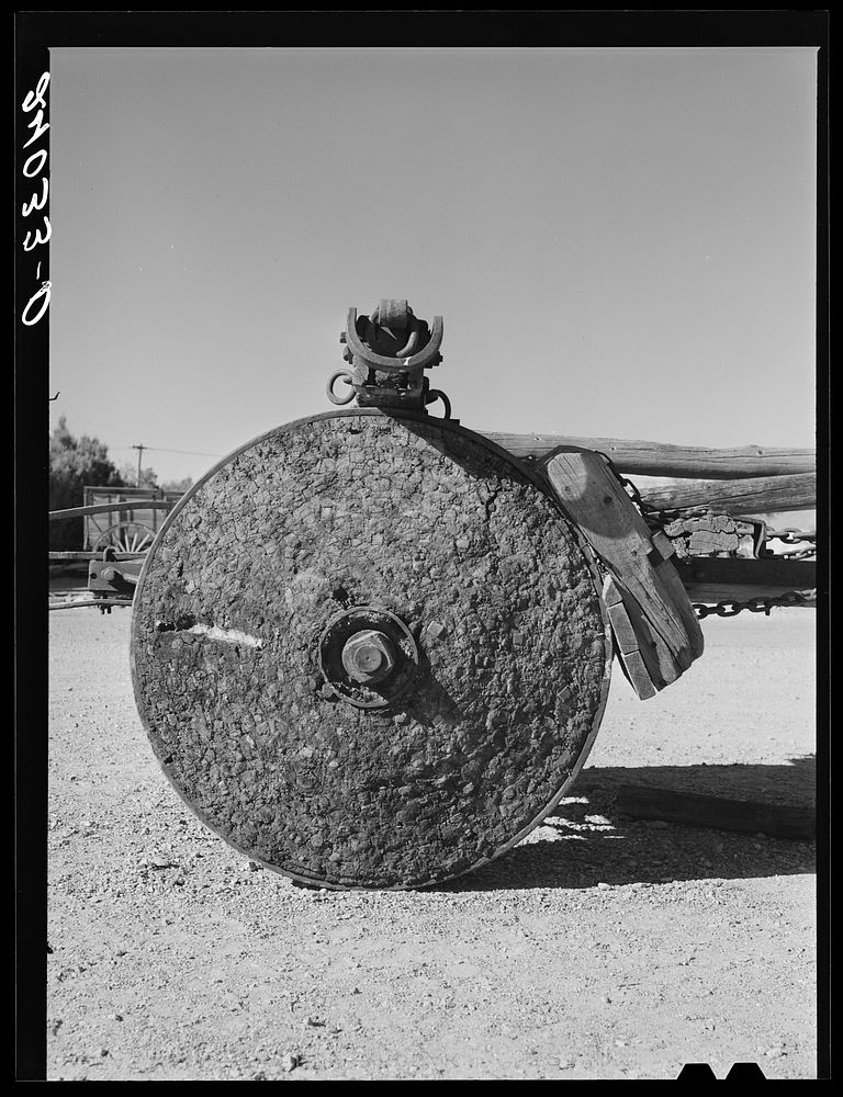 Wheel of borax [i.e., lumber] wagon made from cross section of redwood tree. Death Valley, California. Sourced from the…