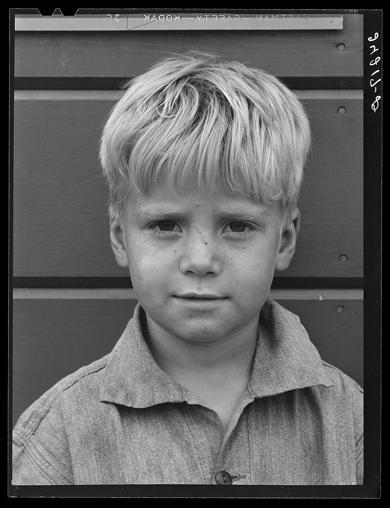 Migrant boy. Tulare migrant camp. Visalia, California. Sourced from the Library of Congress.