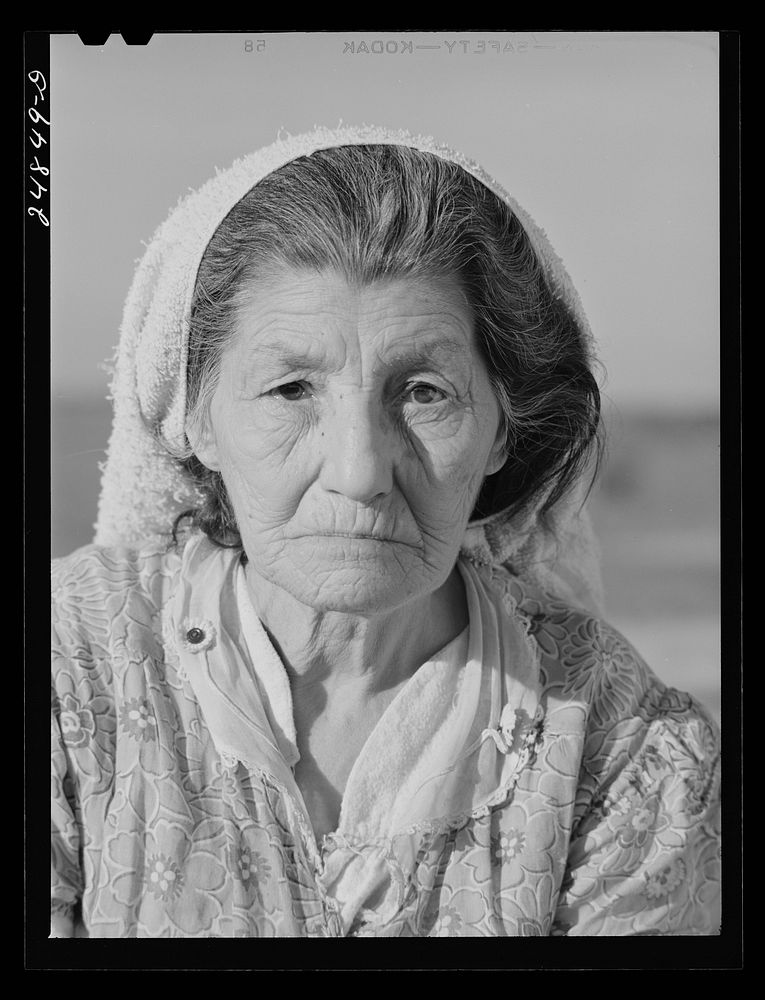 Migratory worker's wife. FSA (Farm Security Administration) camp, Robstown, Texas Robstown, Texas. Migratory farm worker's…