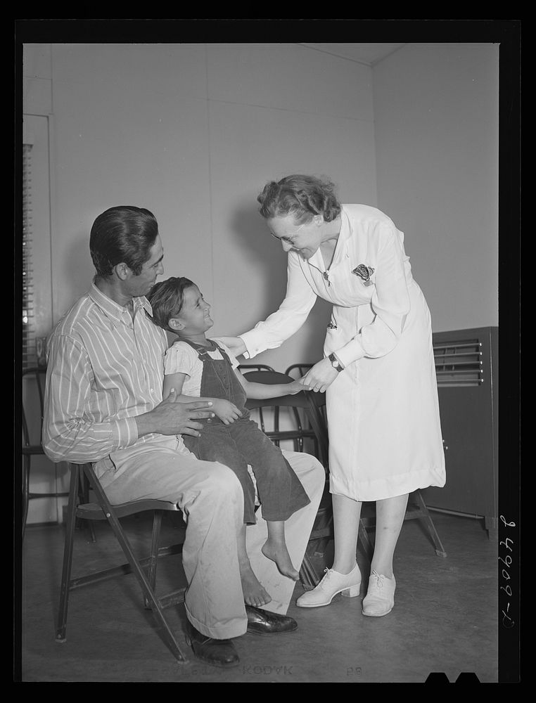 [Untitled photo, possibly related to: Nurse Doris Dill with young patient. Robstown, Texas]. Sourced from the Library of…