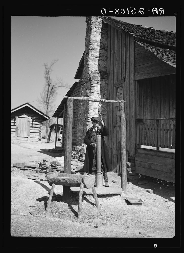 Tenant farmer at well. Walker County, Alabama. Sourced from the Library of Congress.