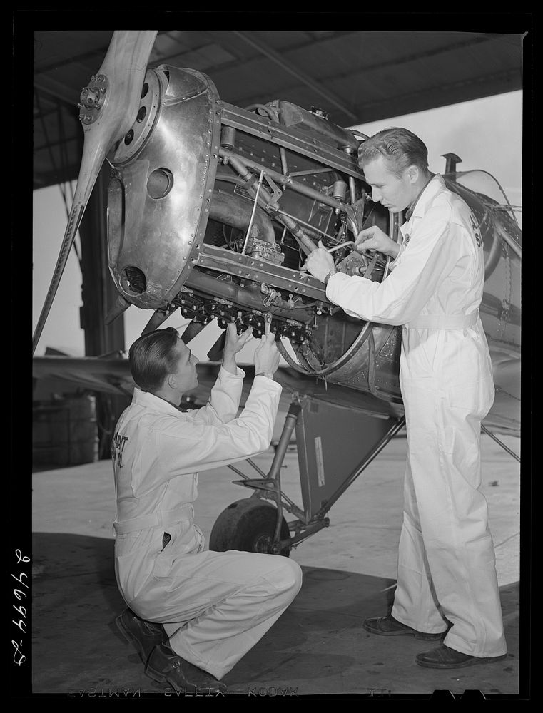 Fort Worth, Texas. Meacham Field. Students repairing plane motor. Sourced from the Library of Congress.