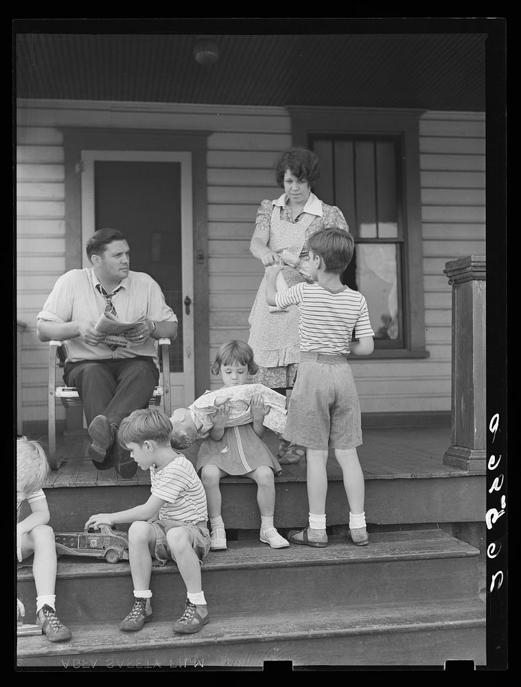 The Shorts family on their front porch. Aliquippa, Pennsylvania. Sourced from the Library of Congress.