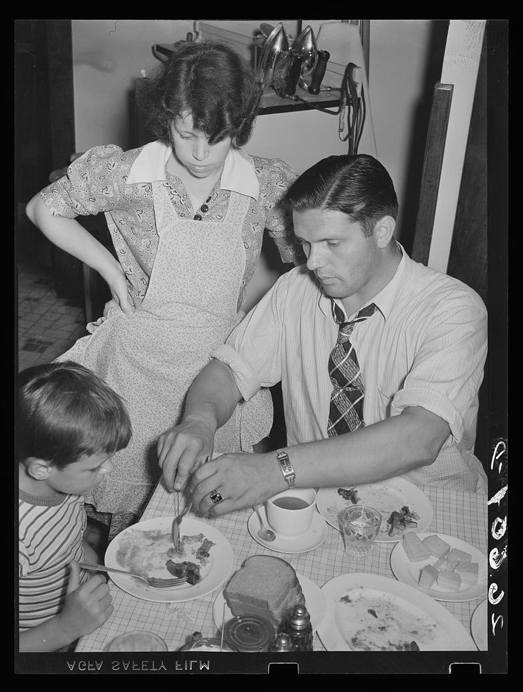 The Shorts family at dinner. Aliquippa, Pennsylvania. Sourced from the Library of Congress.