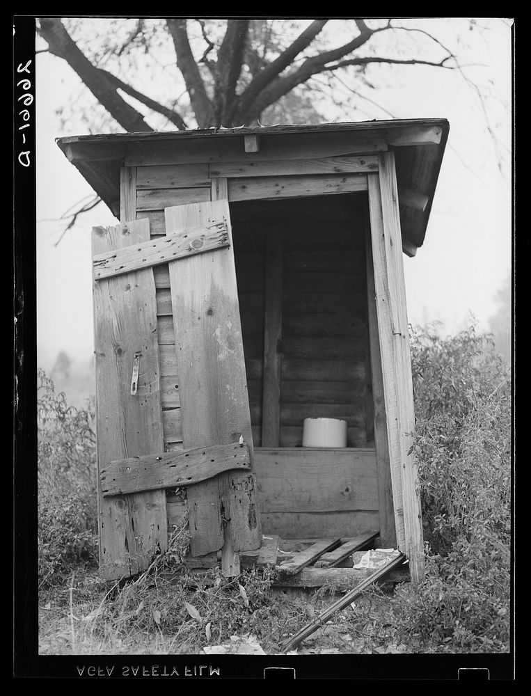 Unsanitary privy on sub-marginal farm. Burlington County, New Jersey. Sourced from the Library of Congress.