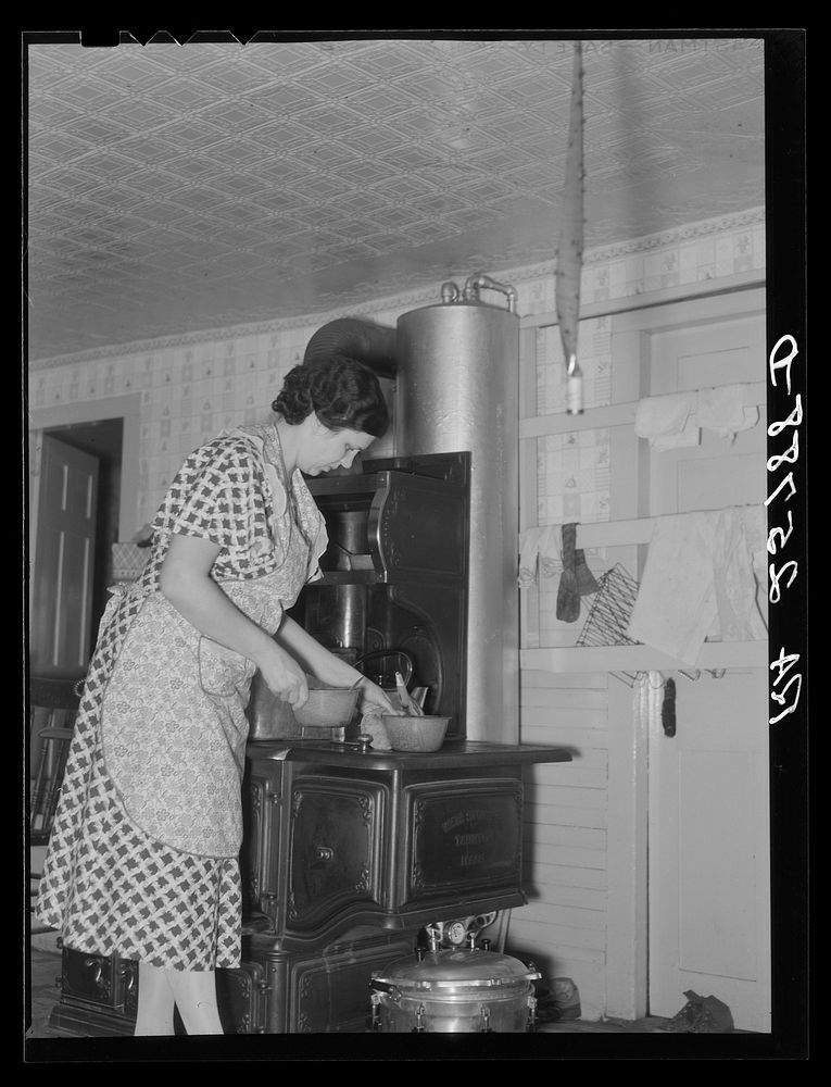 Mrs. McNally in her kitchen. Kirby, Vermont. Sourced from the Library of Congress.