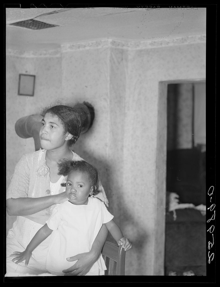 [Untitled photo, possibly related to: Wife and child of prospective homesteader. Newport News Homesteads, Virginia]. Sourced…