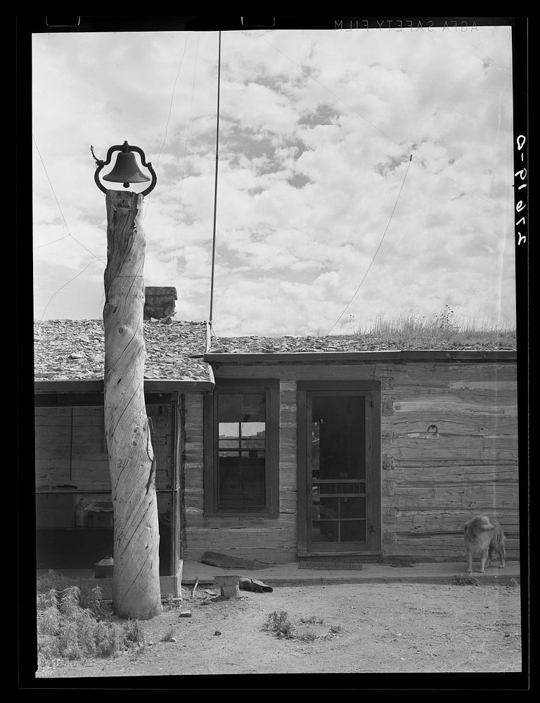 [Untitled photo, possibly related to: Entrance to mess hall. Quarter Circle 'U' Ranch, Montana]. Sourced from the Library of…