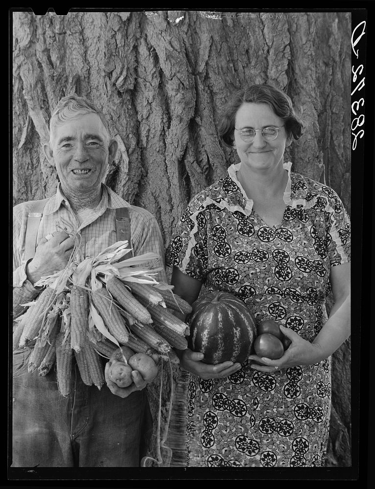 Mr. and Mrs. Andy Bahain, FSA (Farm Security Administration) borrowers, on their farm near Kersey, Colorado. Sourced from…