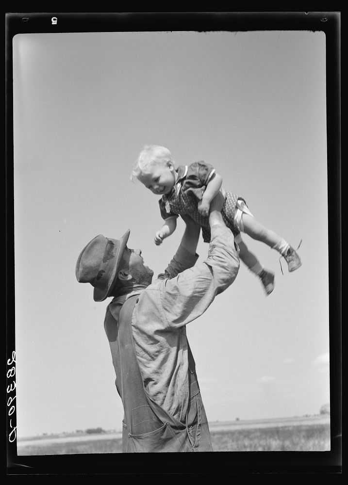 [Untitled photo, possibly related to: Mr. Calvin Brown and grandson, Eaton, Colorado. FSA (Farm Security Administration)…
