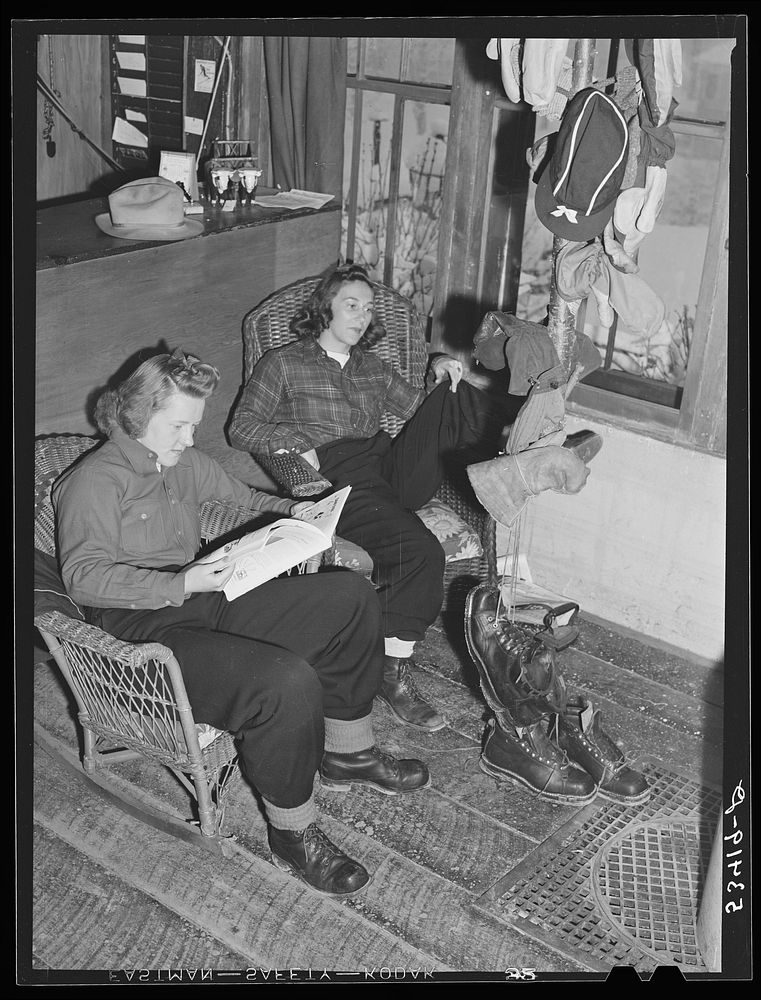 Skiers from Boston, Massachusetts, relaxing in lodge living room at North Conway, New Hampshire. Sourced from the Library of…