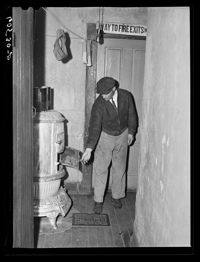 Hallway of thirty-five cents a night hotel. Dubuque, Iowa. Sourced from the Library of Congress.