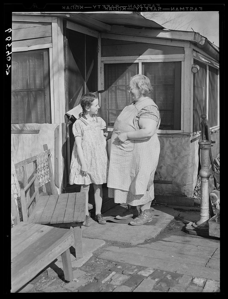 [Untitled photo, possibly related to: Resident of riverfront shacktown. Dubuque, Iowa]. Sourced from the Library of Congress.