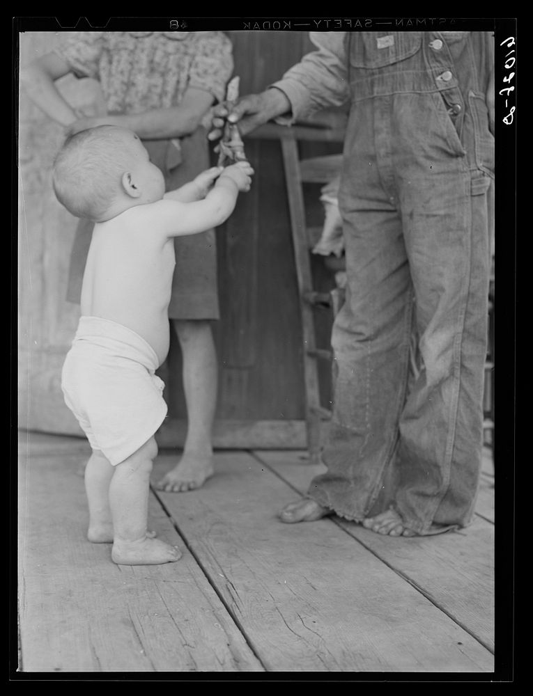 [Untitled photo, possibly related to: Baby of sharecropper. New Madrid County, Missouri]. Sourced from the Library of…