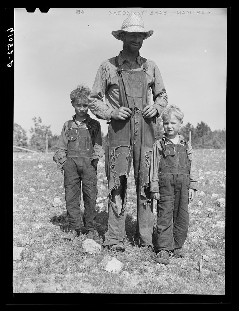 [Untitled photo, possibly related to: Ozark Mountain farmer and family. Missouri]. Sourced from the Library of Congress.