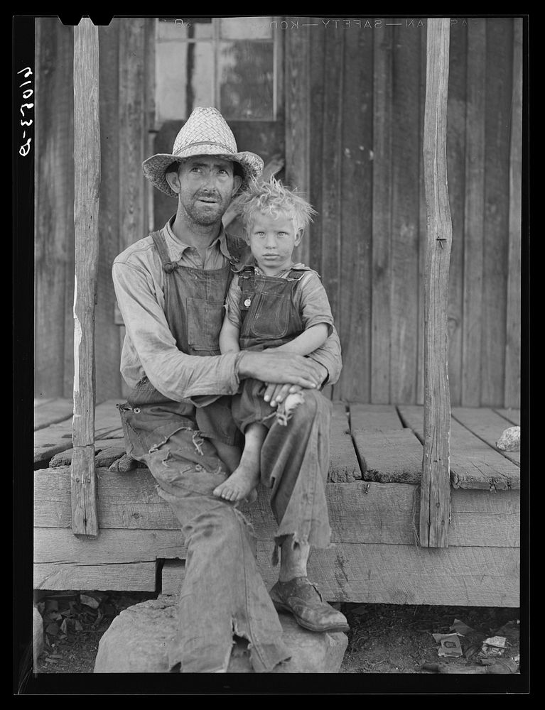[Untitled photo, possibly related to: Ozark Mountain farmer and family. Missouri]. Sourced from the Library of Congress.
