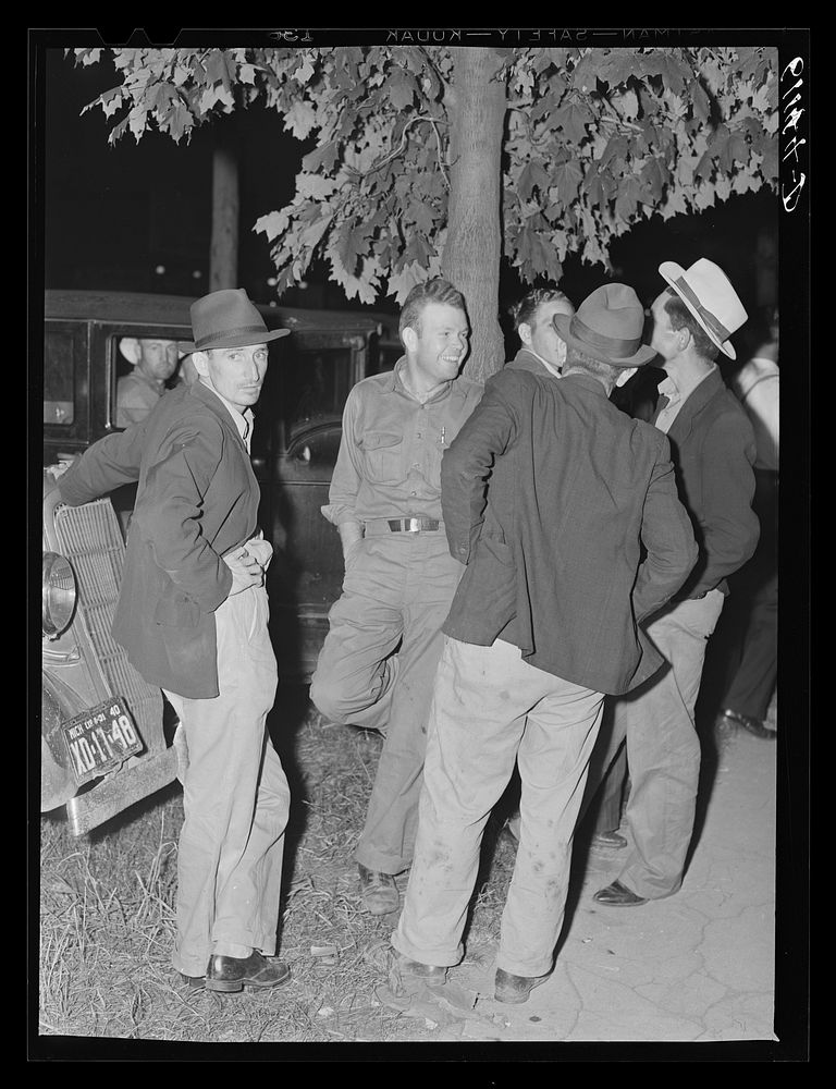 Migrant fruit workers in town on Saturday night. Millburg, Michigan. Sourced from the Library of Congress.