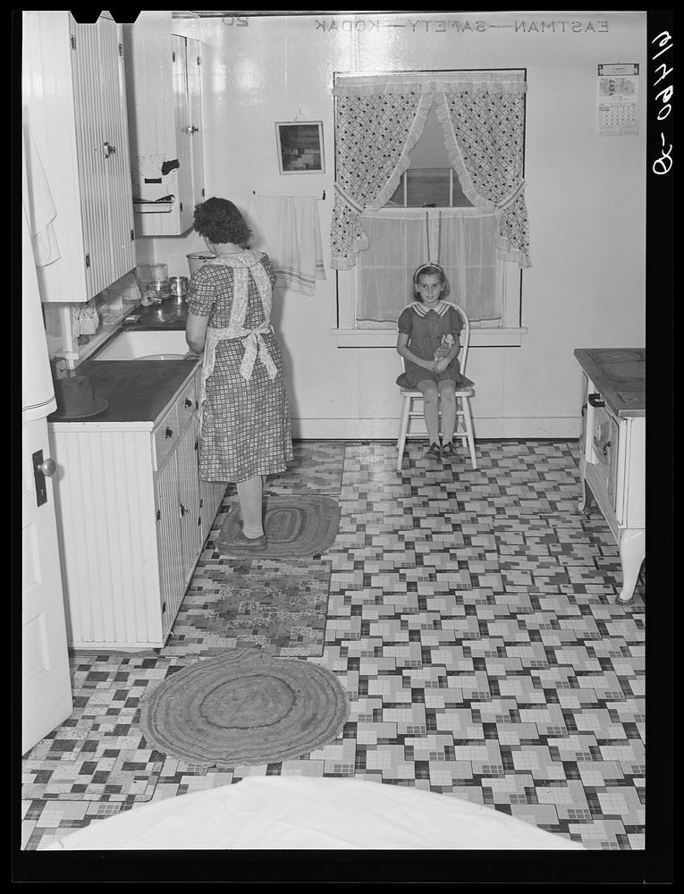 Mrs. Hersch in kitchen of farm unit. Red River Valley Farms, North Dakota. Sourced from the Library of Congress.