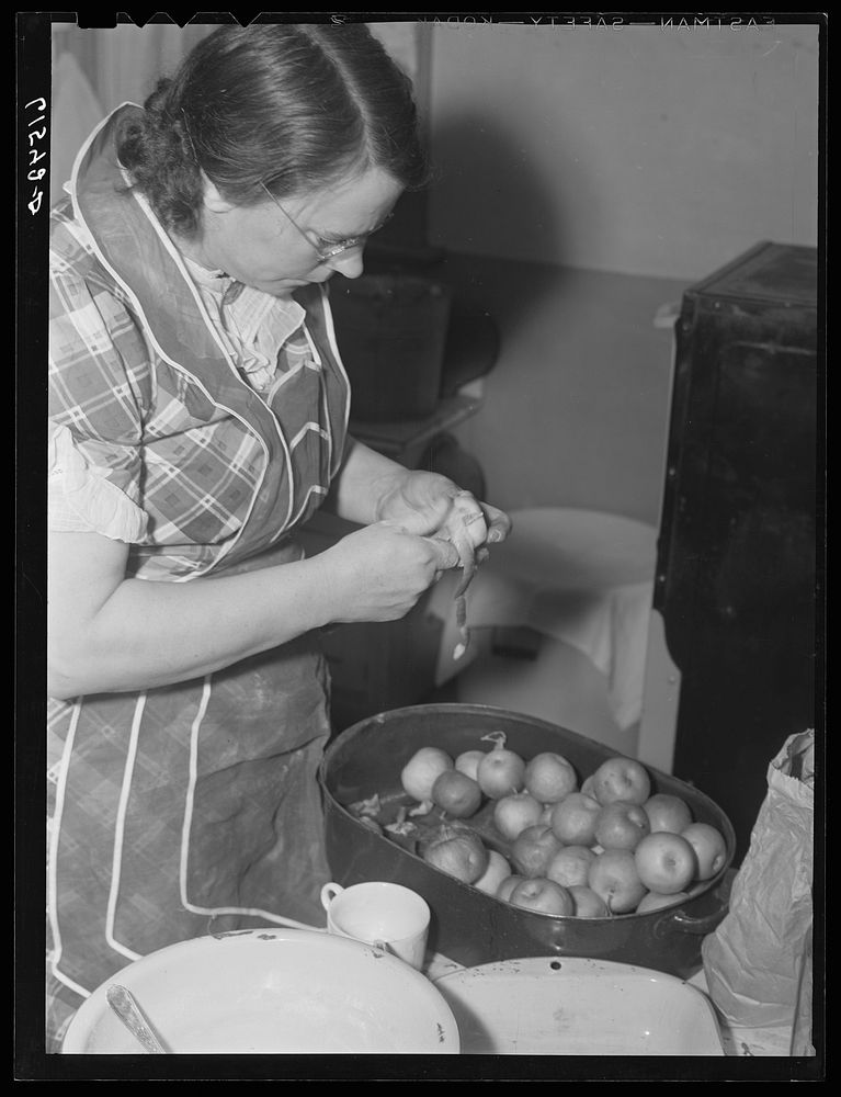 Mrs. Sauer peeling apples. Cavalier | Free Photo - rawpixel