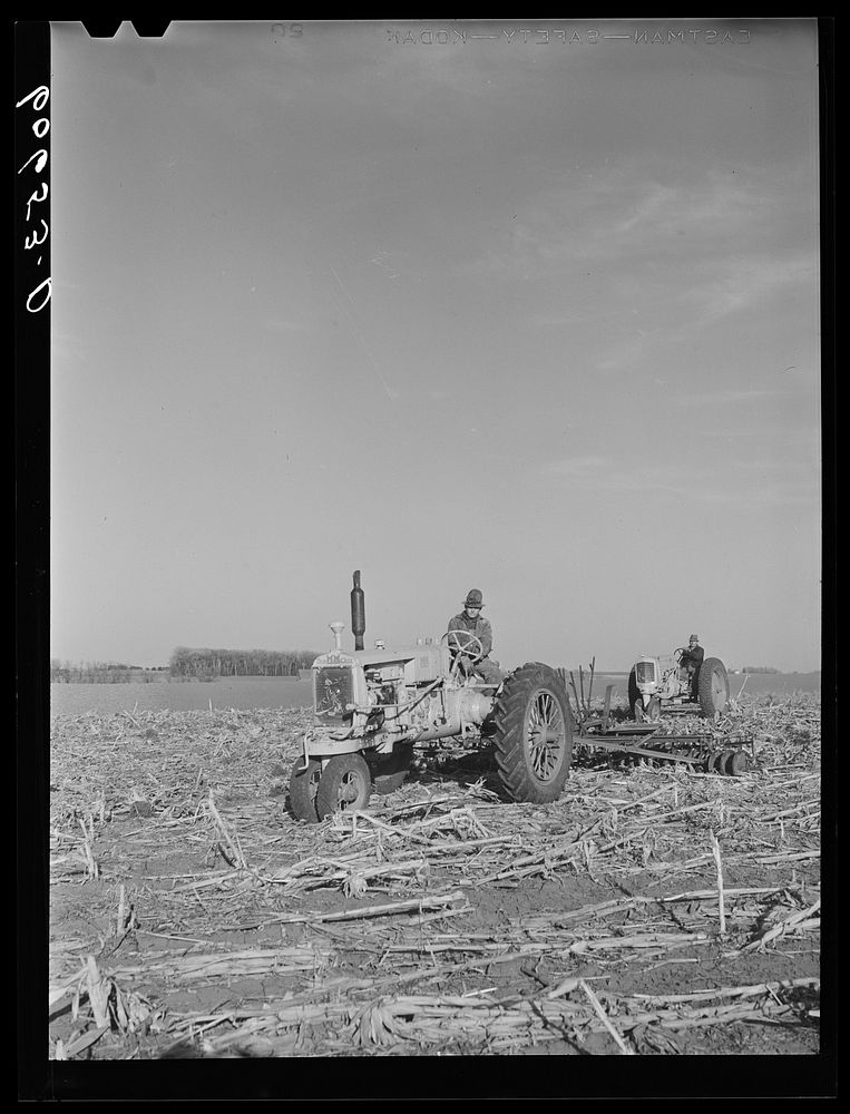 Father and son preparing a piece of land for corn planting. Grundy County, Iowa. Sourced from the Library of Congress.