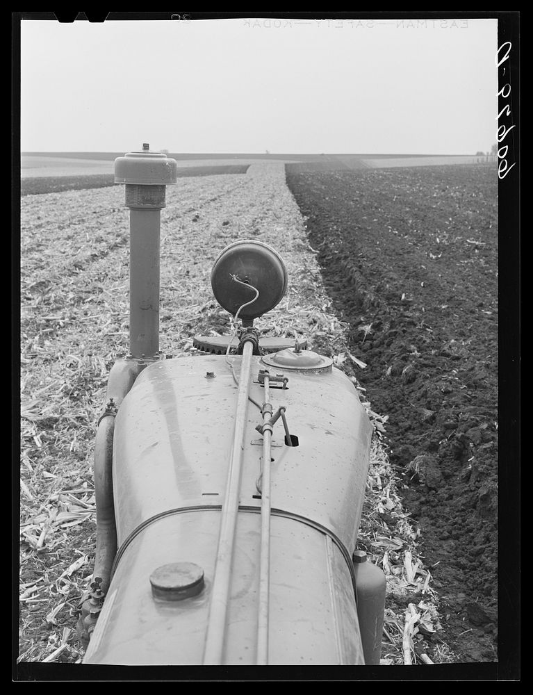 [Untitled photo, possibly related to: Tractor plowing in field. Grundy County, Iowa]. Sourced from the Library of Congress.