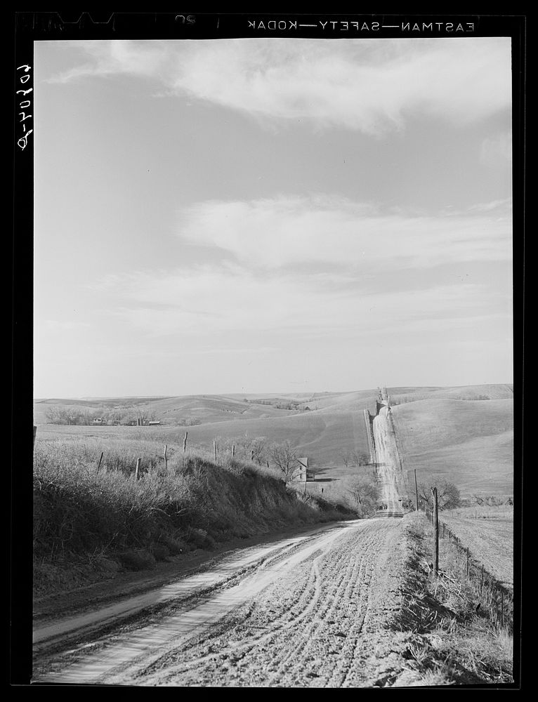 County road in Western Iowa corn country. Monona County, Iowa. Sourced from the Library of Congress.
