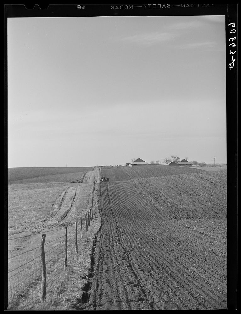 [Untitled photo, possibly related to: Harrowing the ground before corn planting. Jasper County, Iowa]. Sourced from the…