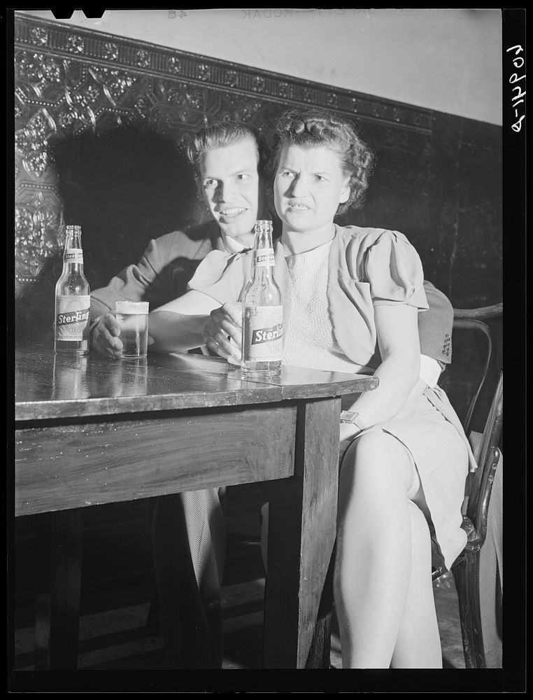 Young couple in beer parlor. Cairo, Illinois. Sourced from the Library of Congress.