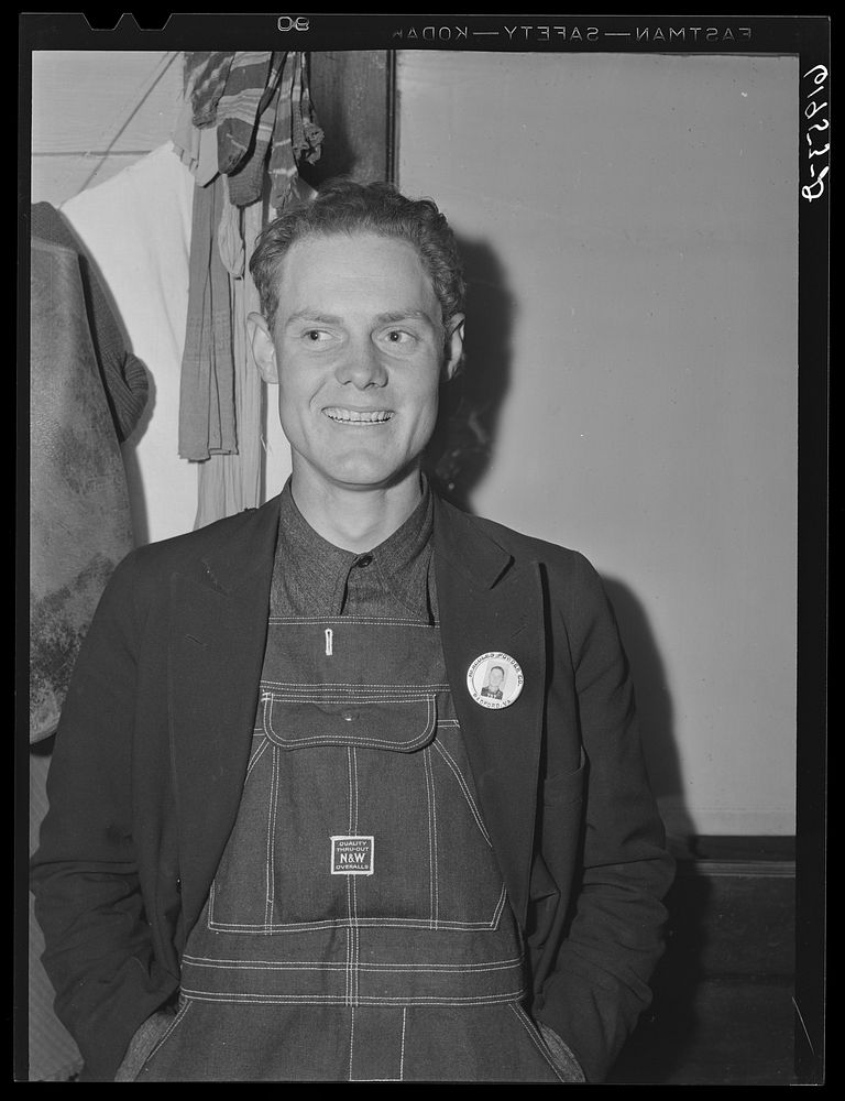 Leo Donathon wearing his identification badge for Hercules powder plant. Radford, Virginia. Sourced from the Library of…