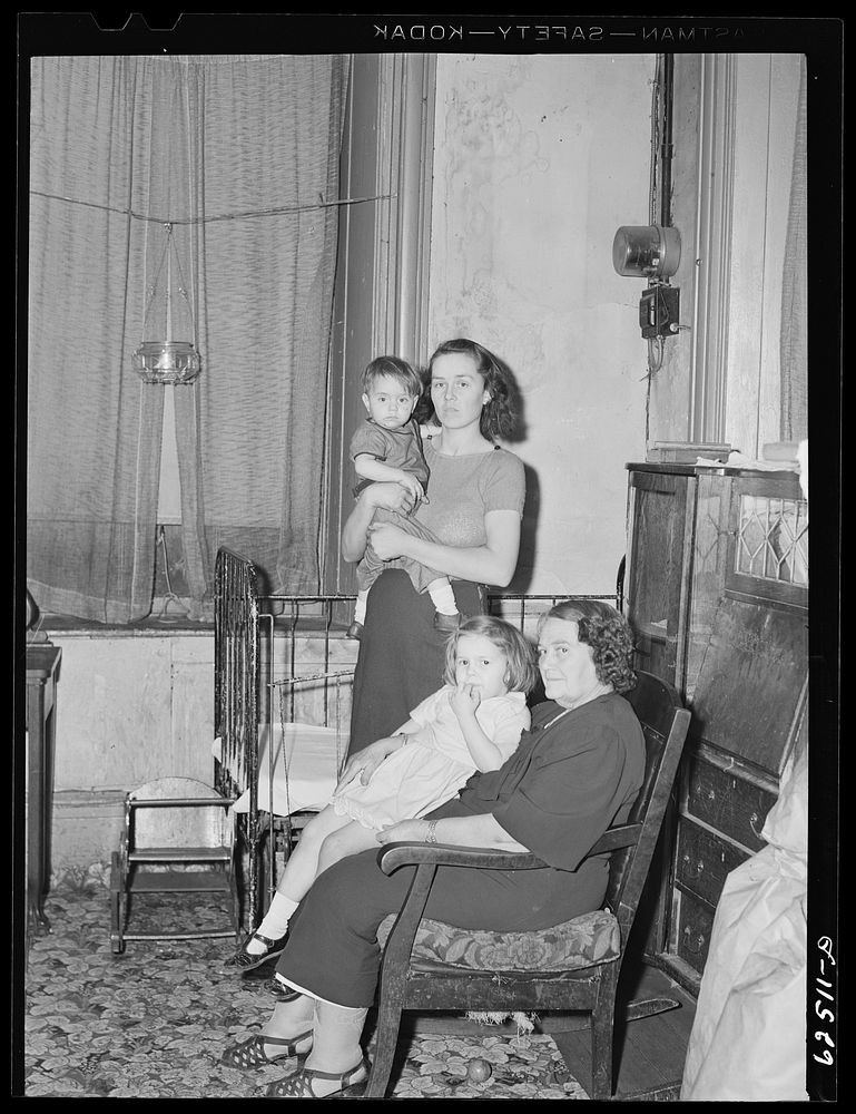 [Untitled photo, possibly related to: Wife and child of Navy yard worker from North Carolina, now living in one room…