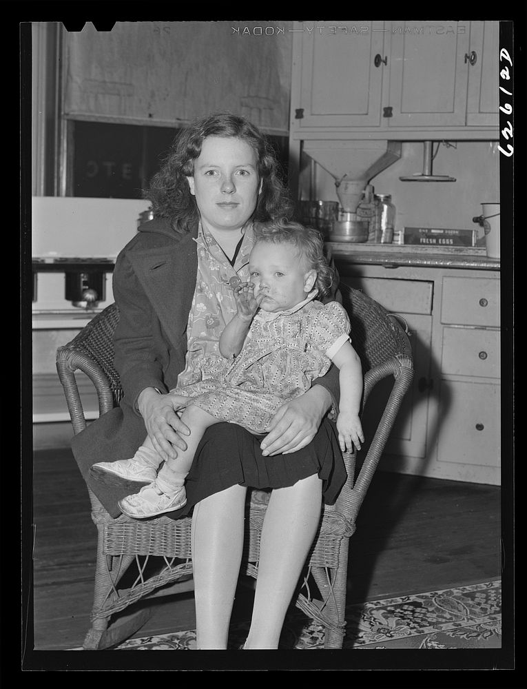 Wife and child of defense worker from North Carolina. Portsmouth, Virginia. Sourced from the Library of Congress.