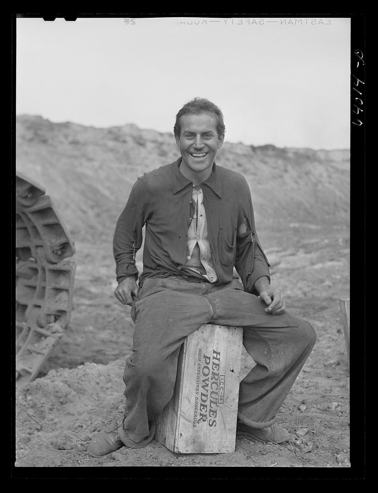 [Untitled photo, possibly related to: Member of blasting crew at Danube Mine near Bovey, Minnesota]. Sourced from the…