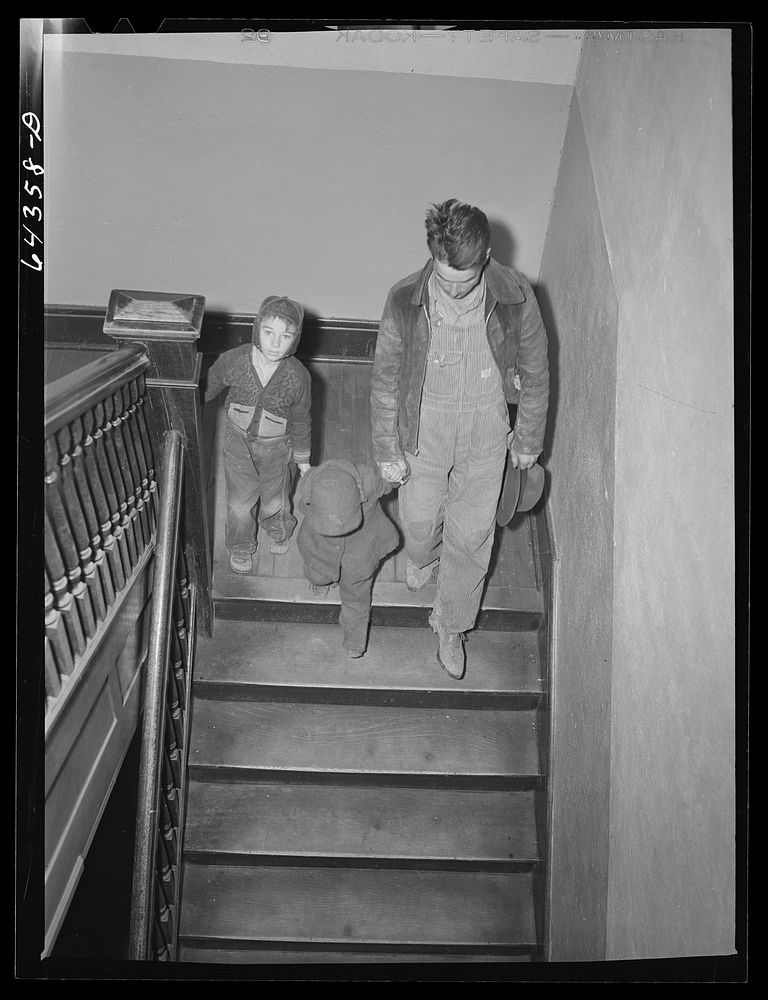 Chaffee, Missouri. Father and children leaving doctor's office. Sourced from the Library of Congress.
