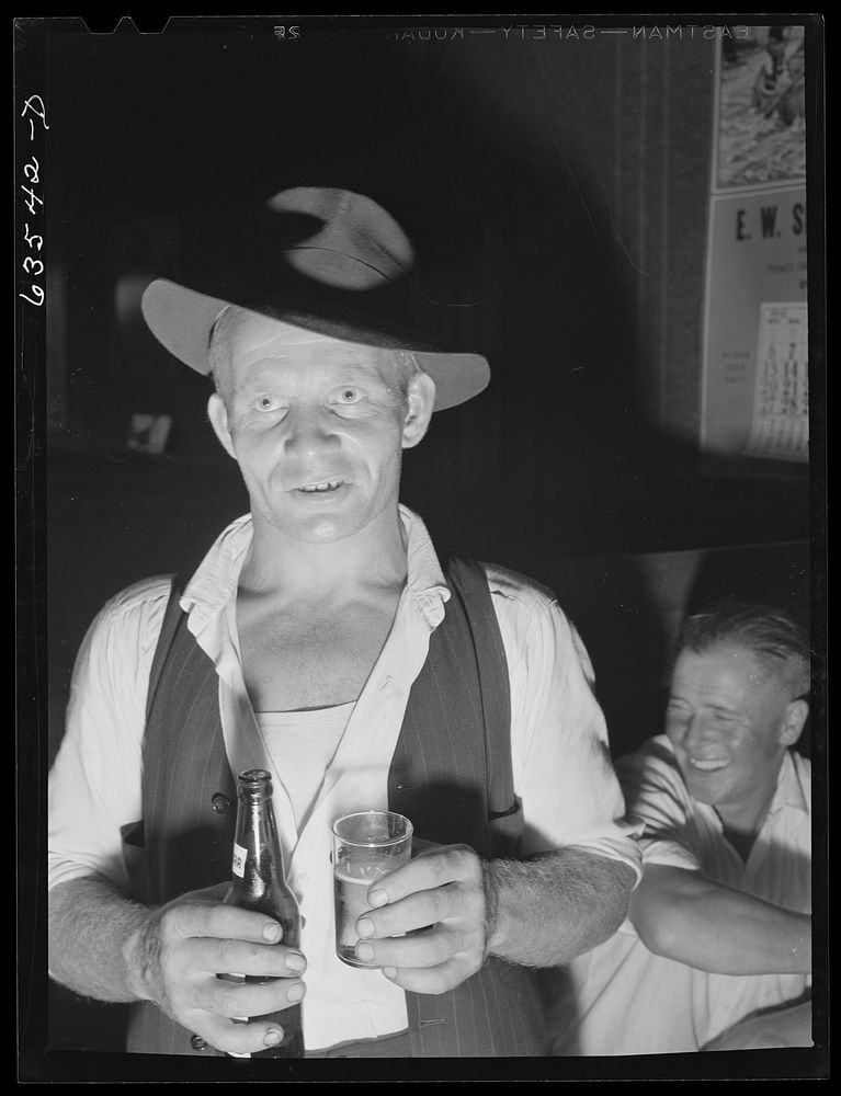 Farm boy in beer parlor on Sunday afternoon. Bruce Crossing, Michigan. Sourced from the Library of Congress.