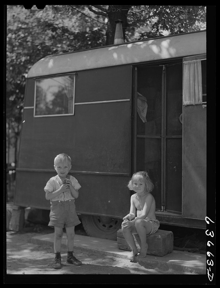 Children of defense worker living in Daniels trailer park. Outskirts of Detroit, Michigan. Sourced from the Library of…